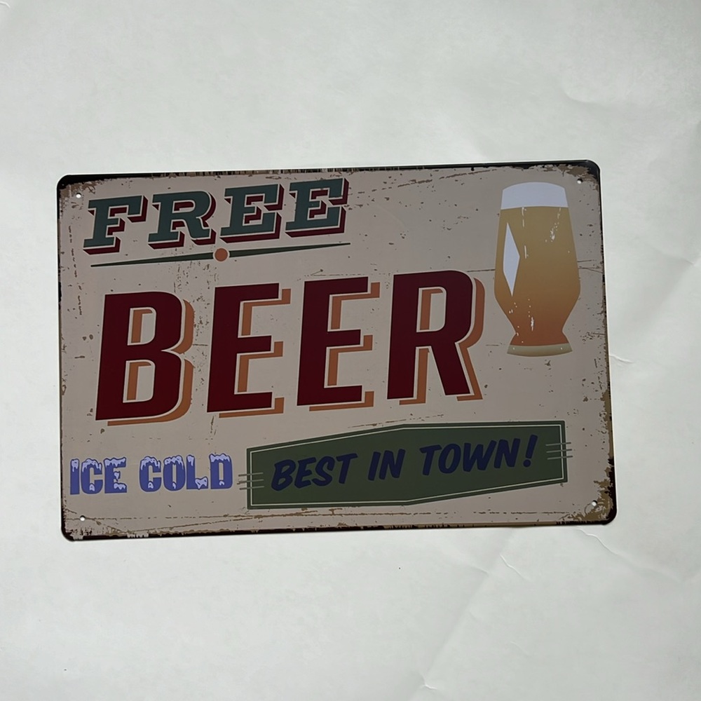 Free beer tin sign